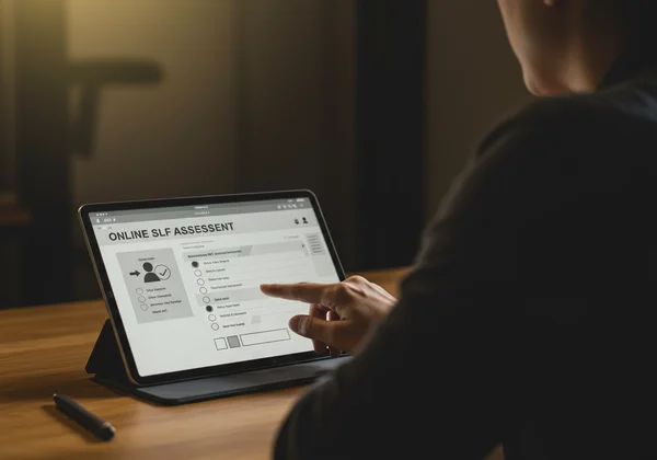 Person taking a confidential online self-assessment test